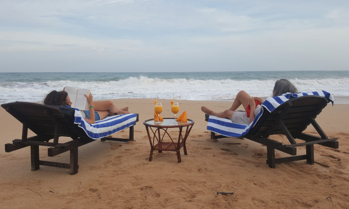 guests relaxing on the beach